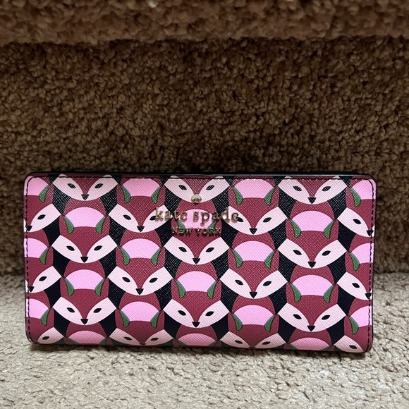 kate spade Handbags - Kate Spade Staci Geo Fox Large Slim Bifold Wallet in Multi Like New